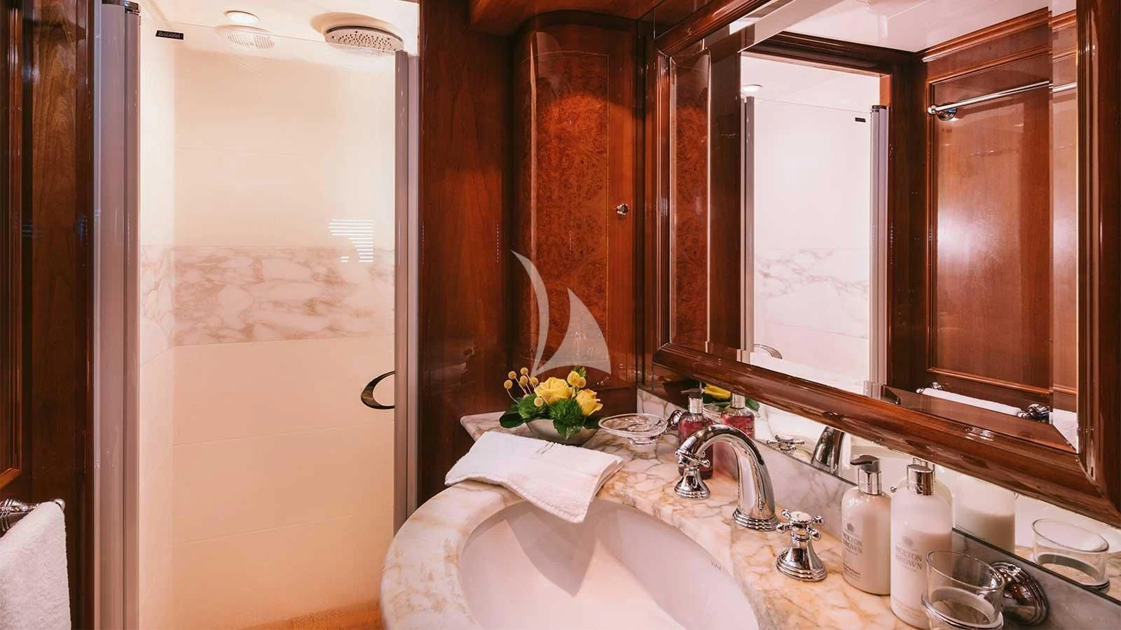 a bathroom with a large bathtub aboard OAK Yacht for Charter