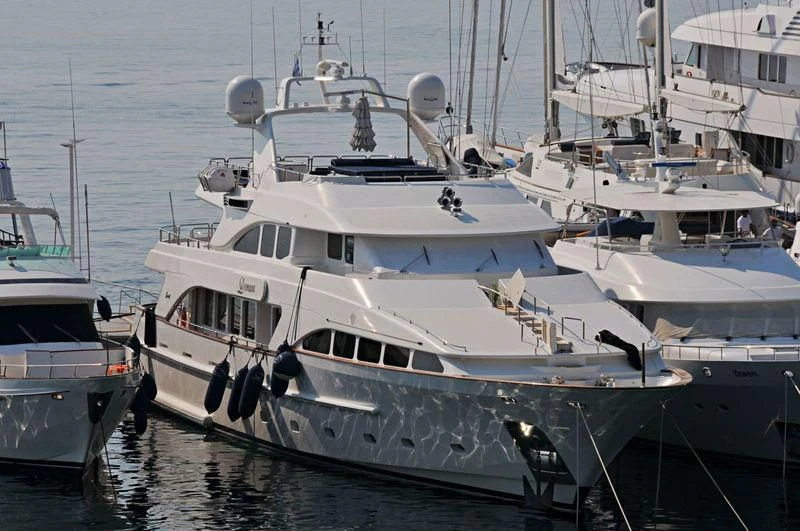 a group of boats in the water aboard OAK Yacht for Charter