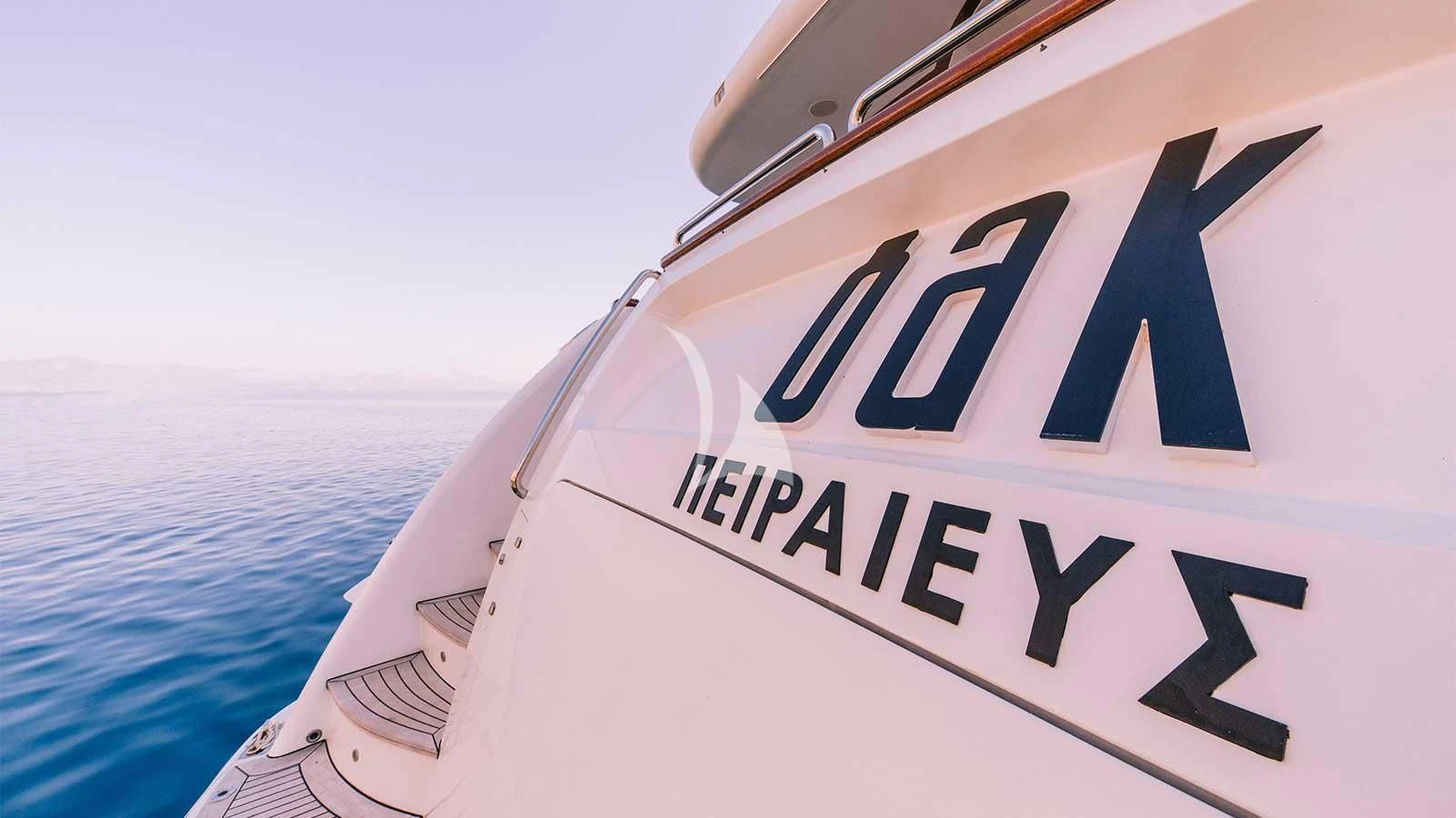 a boat with a sign on it aboard OAK Yacht for Charter