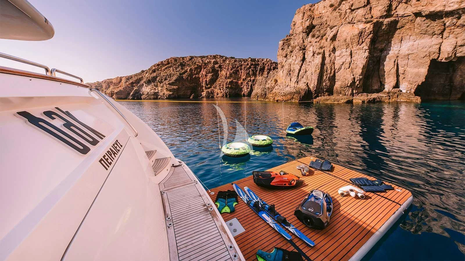 boats on a lake aboard OAK Yacht for Charter