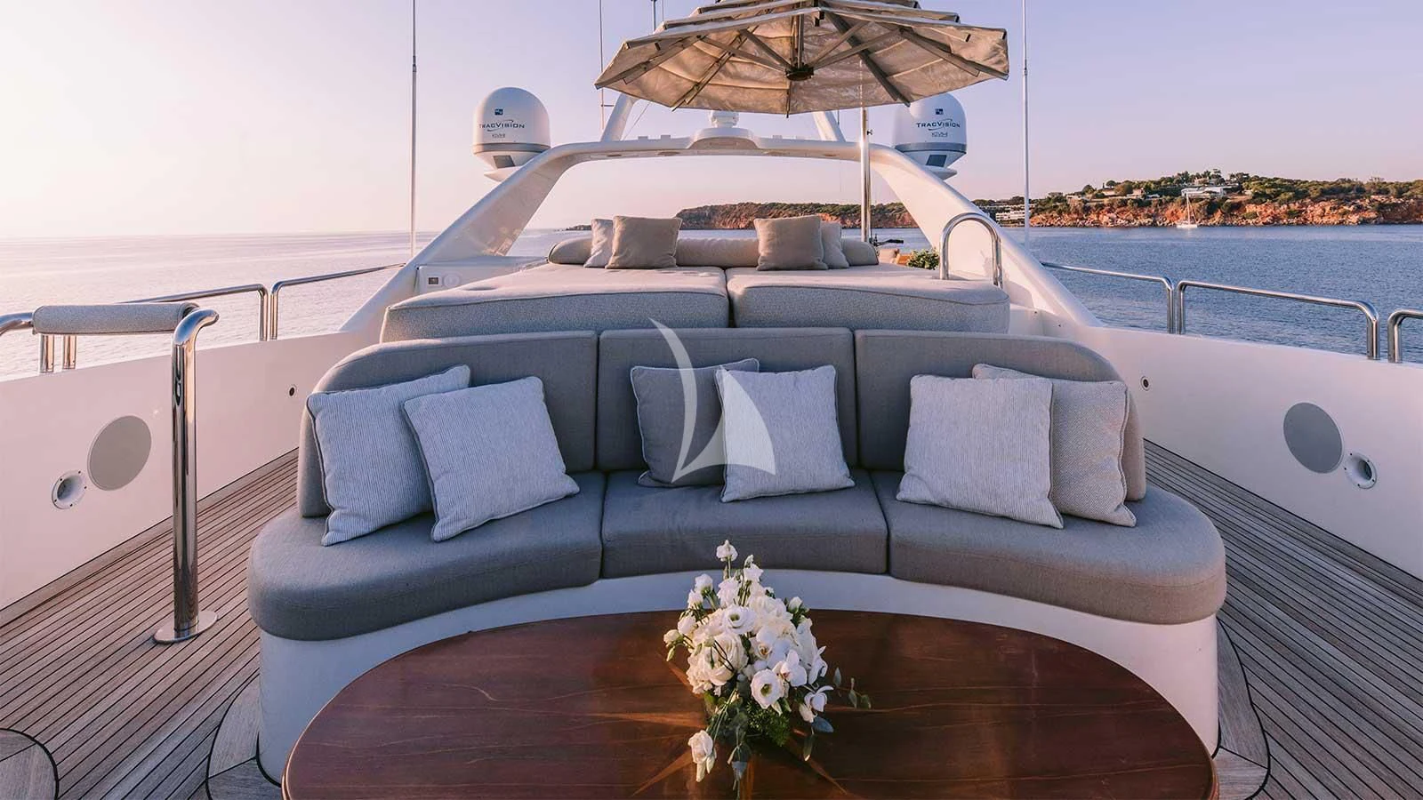 a blue couch on a boat aboard OAK Yacht for Charter