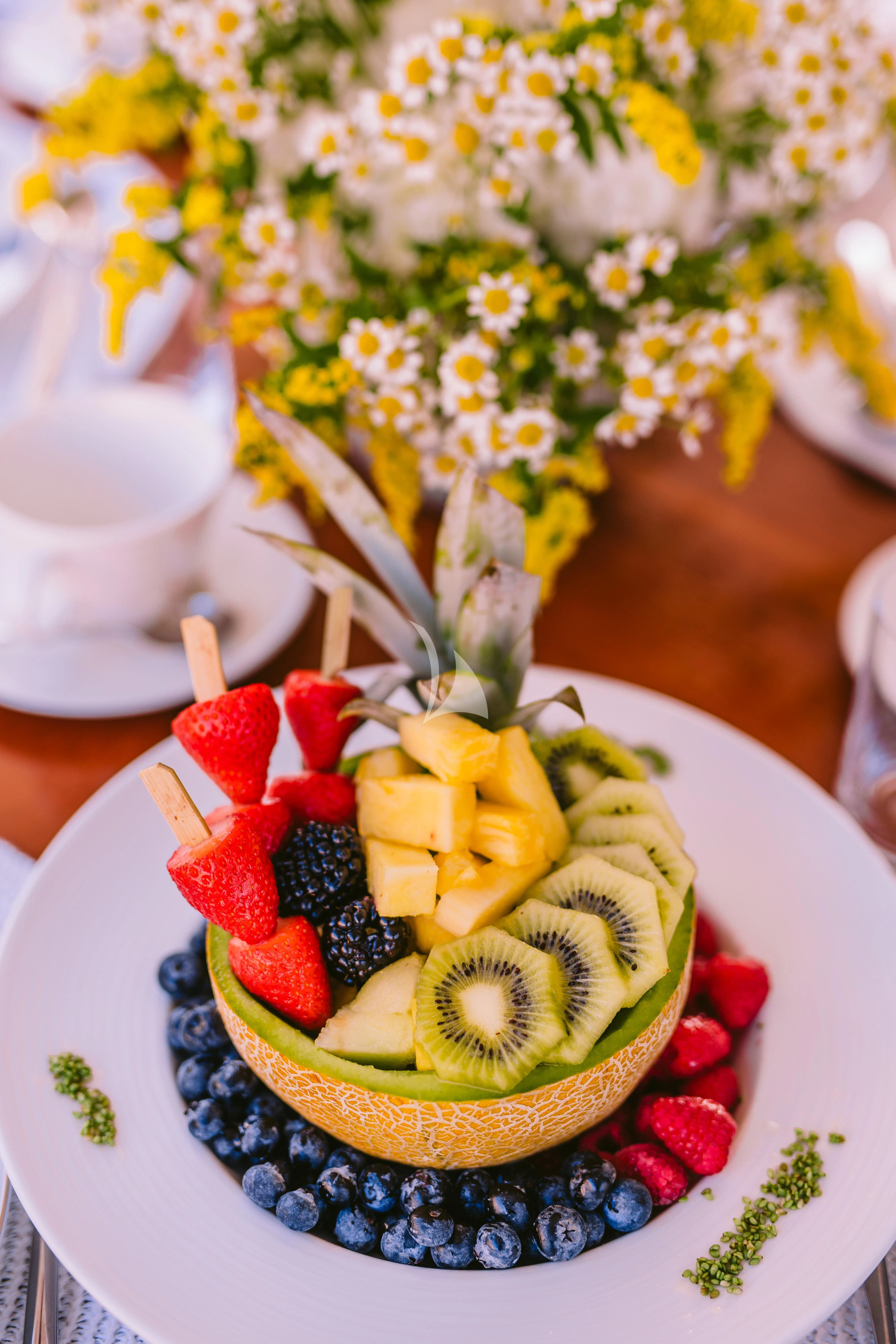 a plate of food aboard OAK Yacht for Charter