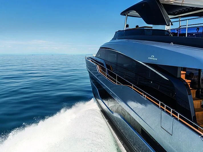 a boat on the water aboard CRANCHI SETTANTOTTO 78/01 Yacht for Sale