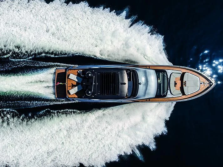 a sunglasses on a rock aboard CRANCHI SETTANTOTTO 78/01 Yacht for Sale