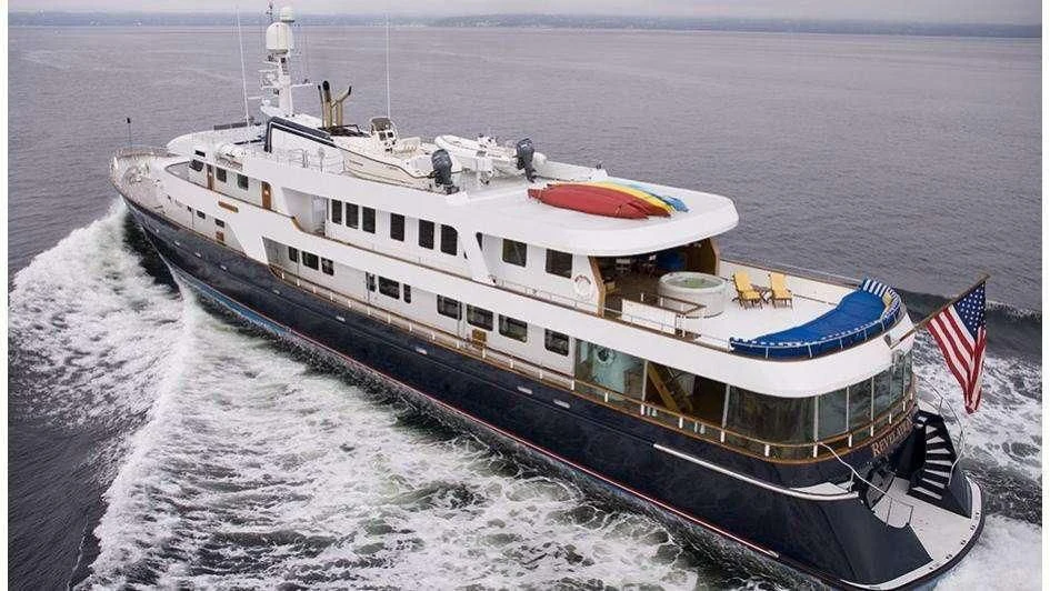 a large ship on the water aboard STARGAZER Yacht for Sale