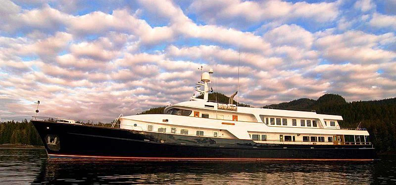 a large boat on the water aboard STARGAZER Yacht for Sale