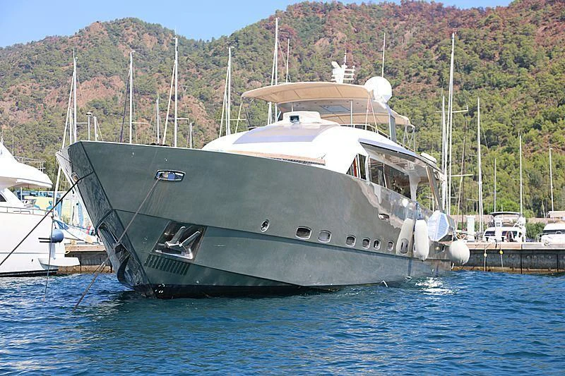 a boat docked at a pier aboard GOLDEN K Yacht for Sale