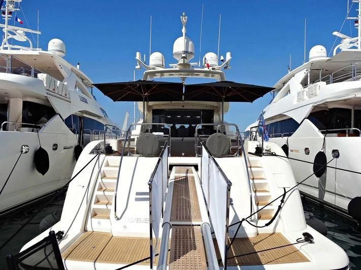 a group of boats in a harbor aboard LA ROMANA Yacht for Sale