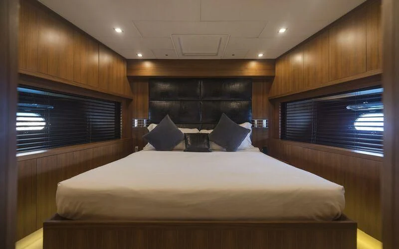 a bed in a room aboard LA ROMANA Yacht for Sale