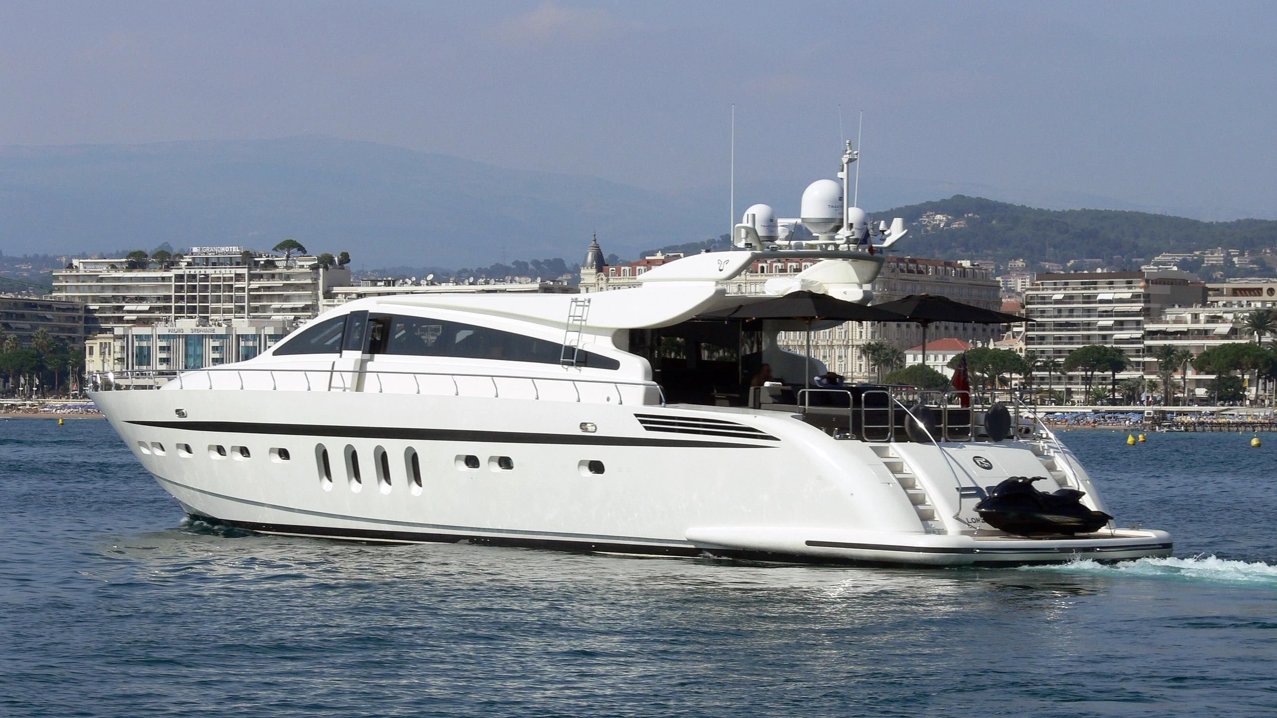 a white yacht in the water aboard LA ROMANA Yacht for Sale