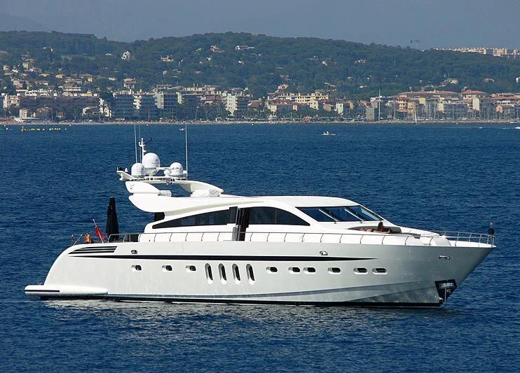a white yacht in the water aboard LA ROMANA Yacht for Sale