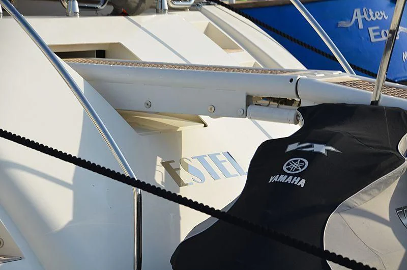 a person's legs on a white surface aboard LA ROMANA Yacht for Sale
