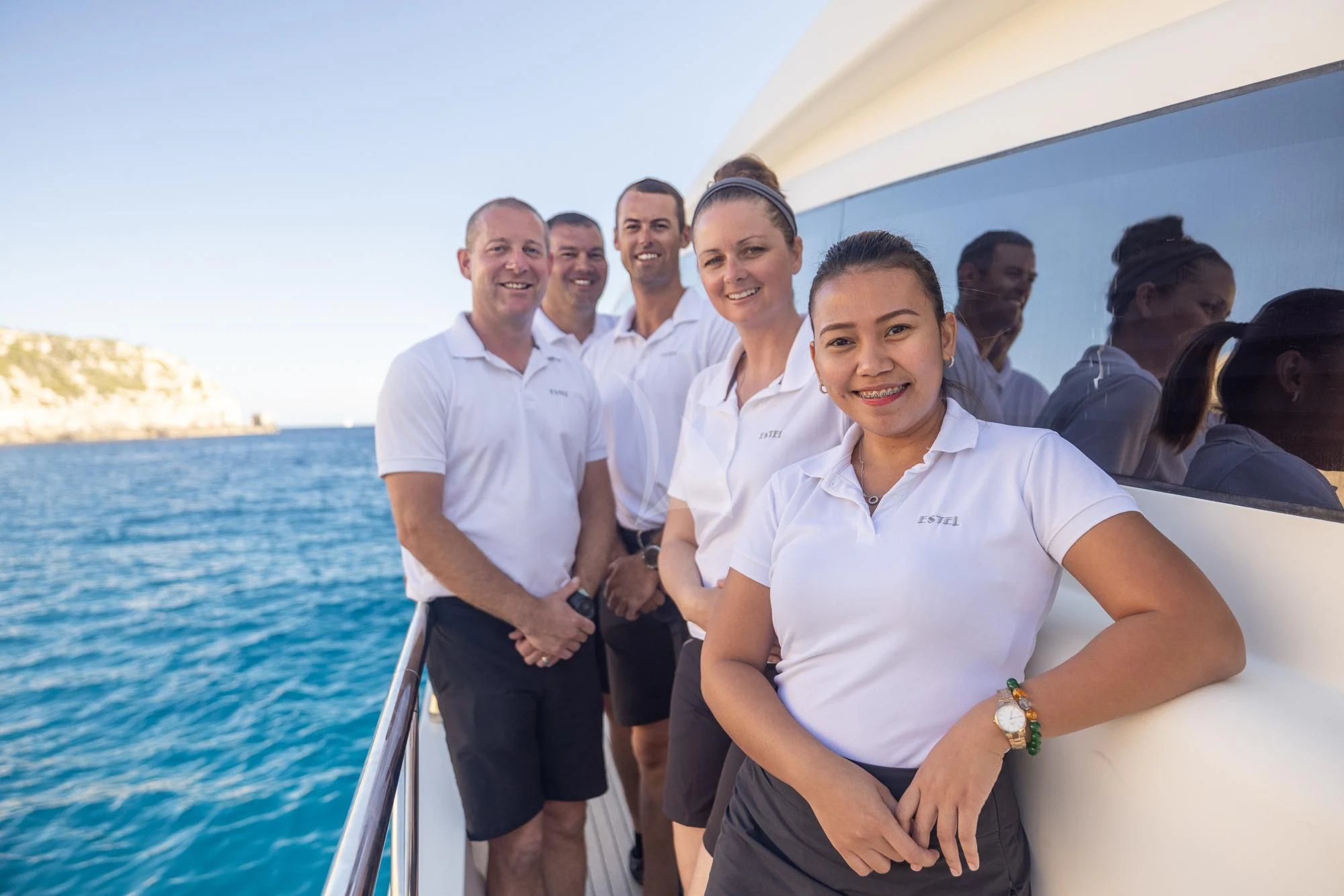 a group of people on a boat aboard LA ROMANA Yacht for Sale