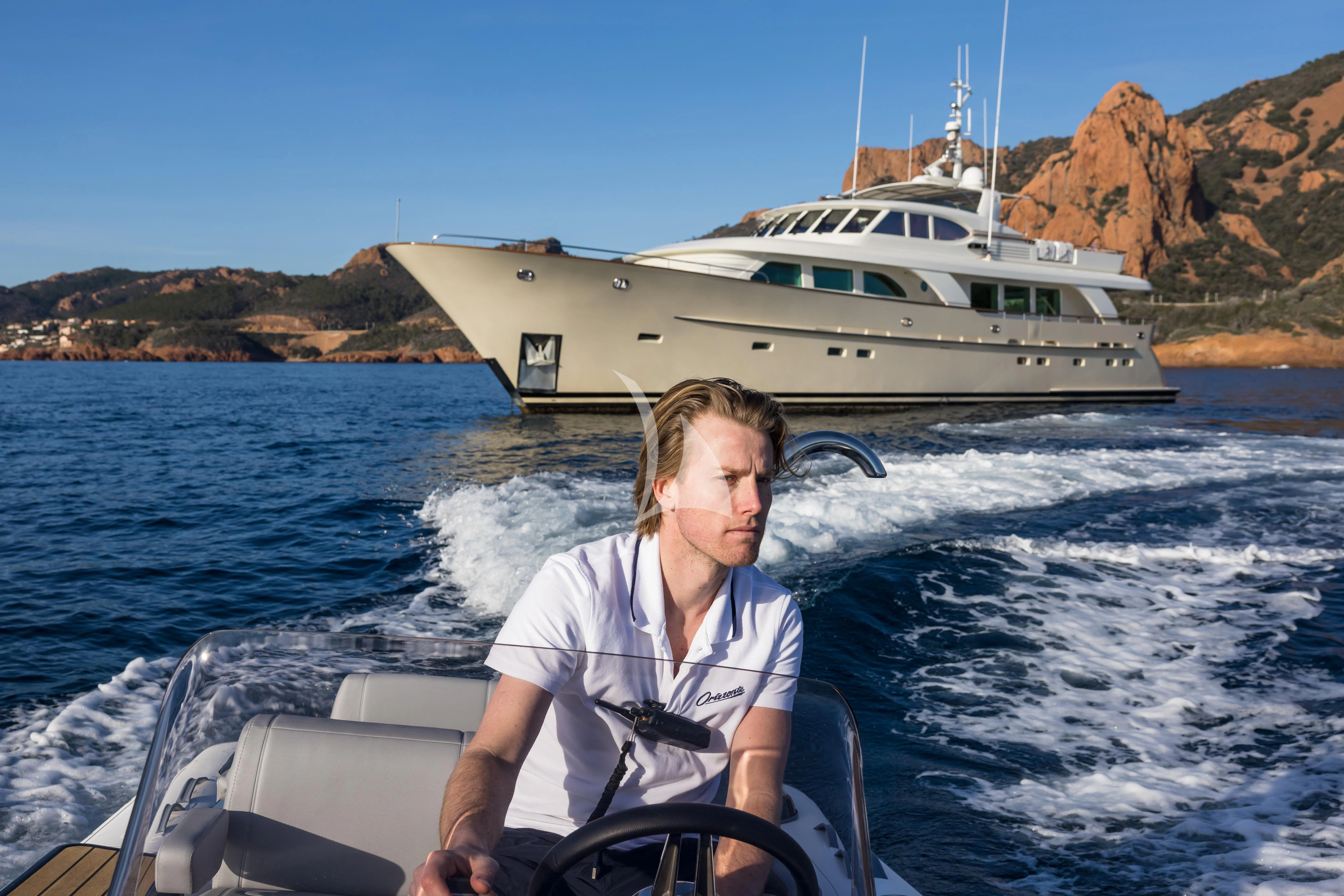 a person on a boat aboard ORIZZONTE Yacht for Sale