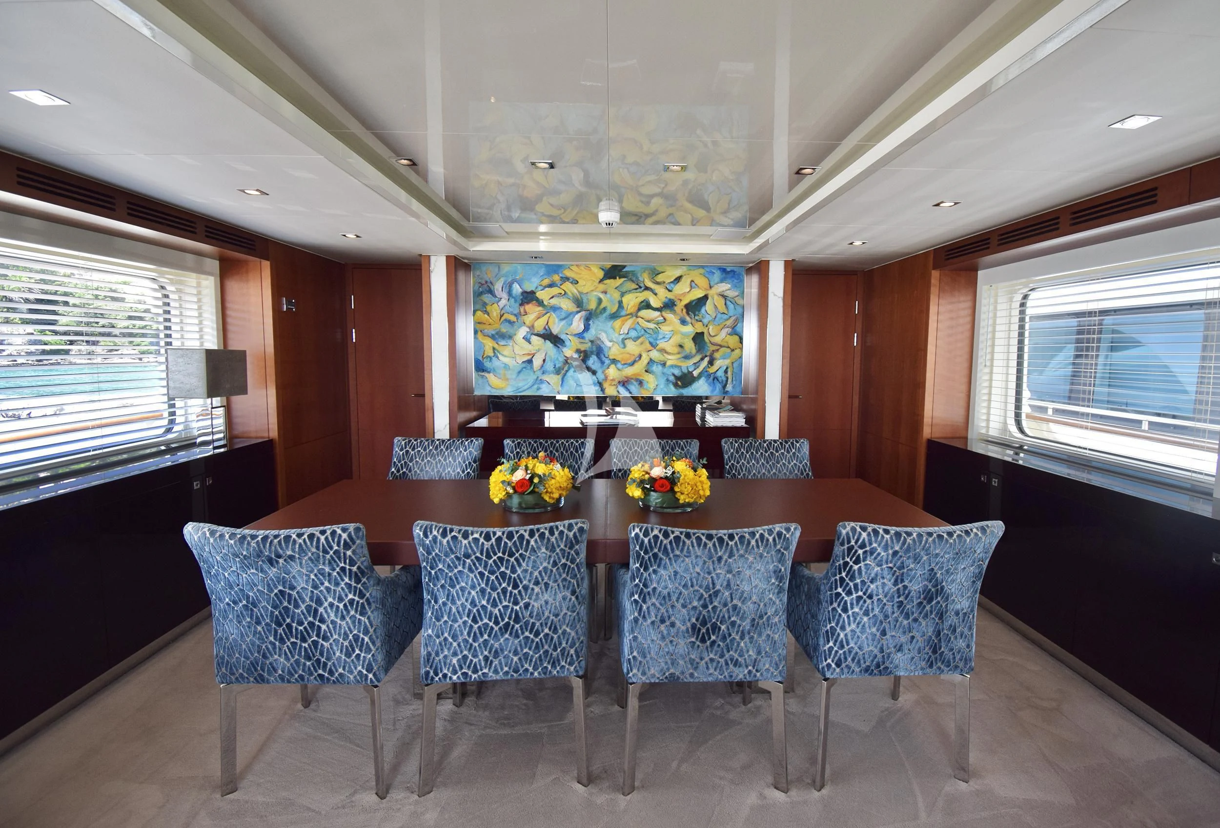 a dining table in a room aboard ORIZZONTE Yacht for Sale