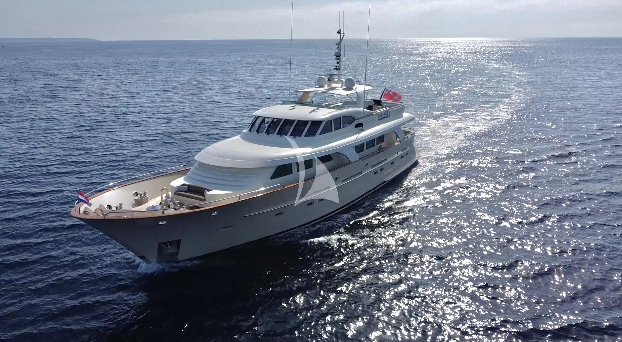 a white yacht in the ocean aboard ORIZZONTE Yacht for Sale