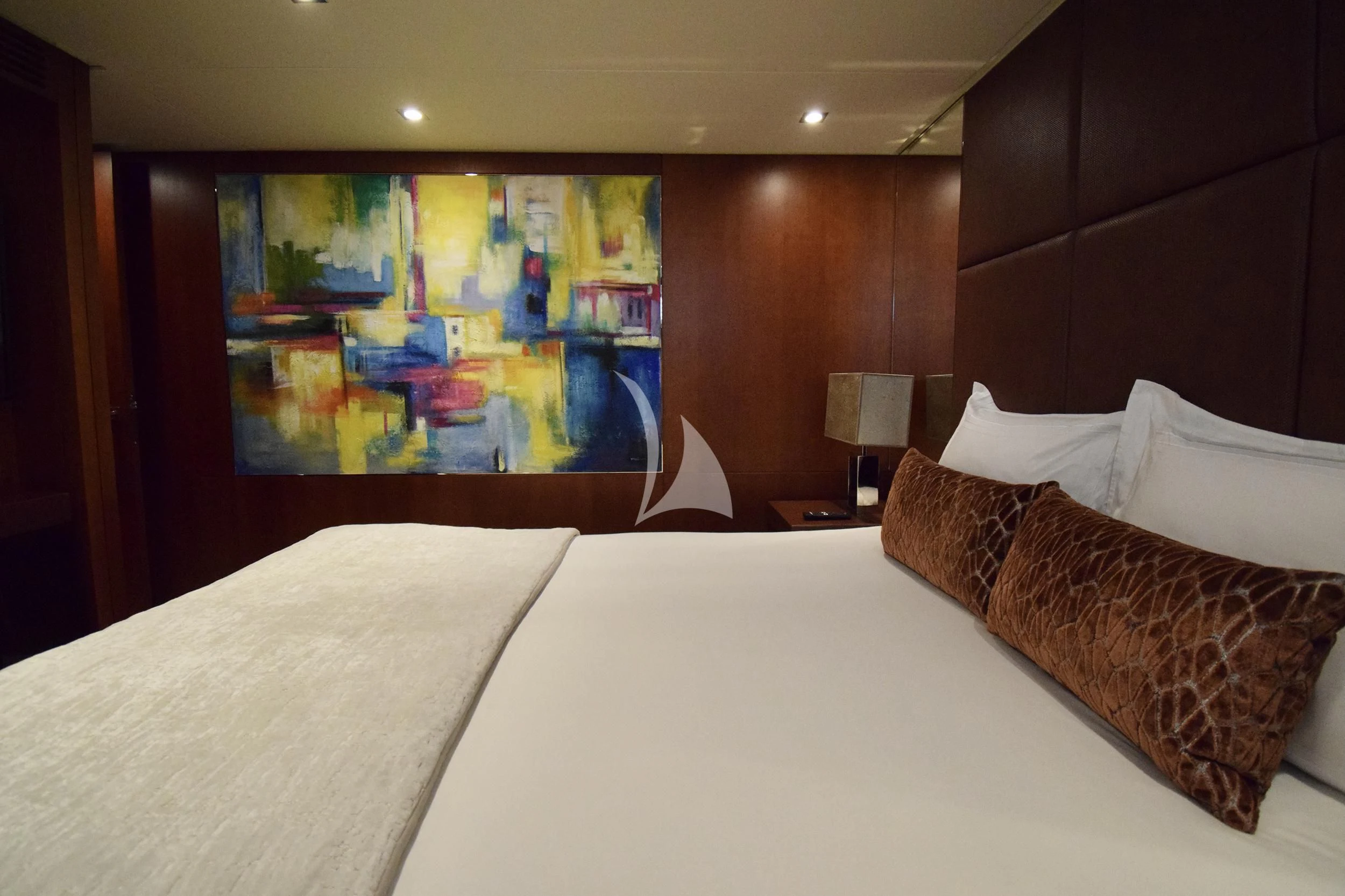 a bed with pillows aboard ORIZZONTE Yacht for Sale