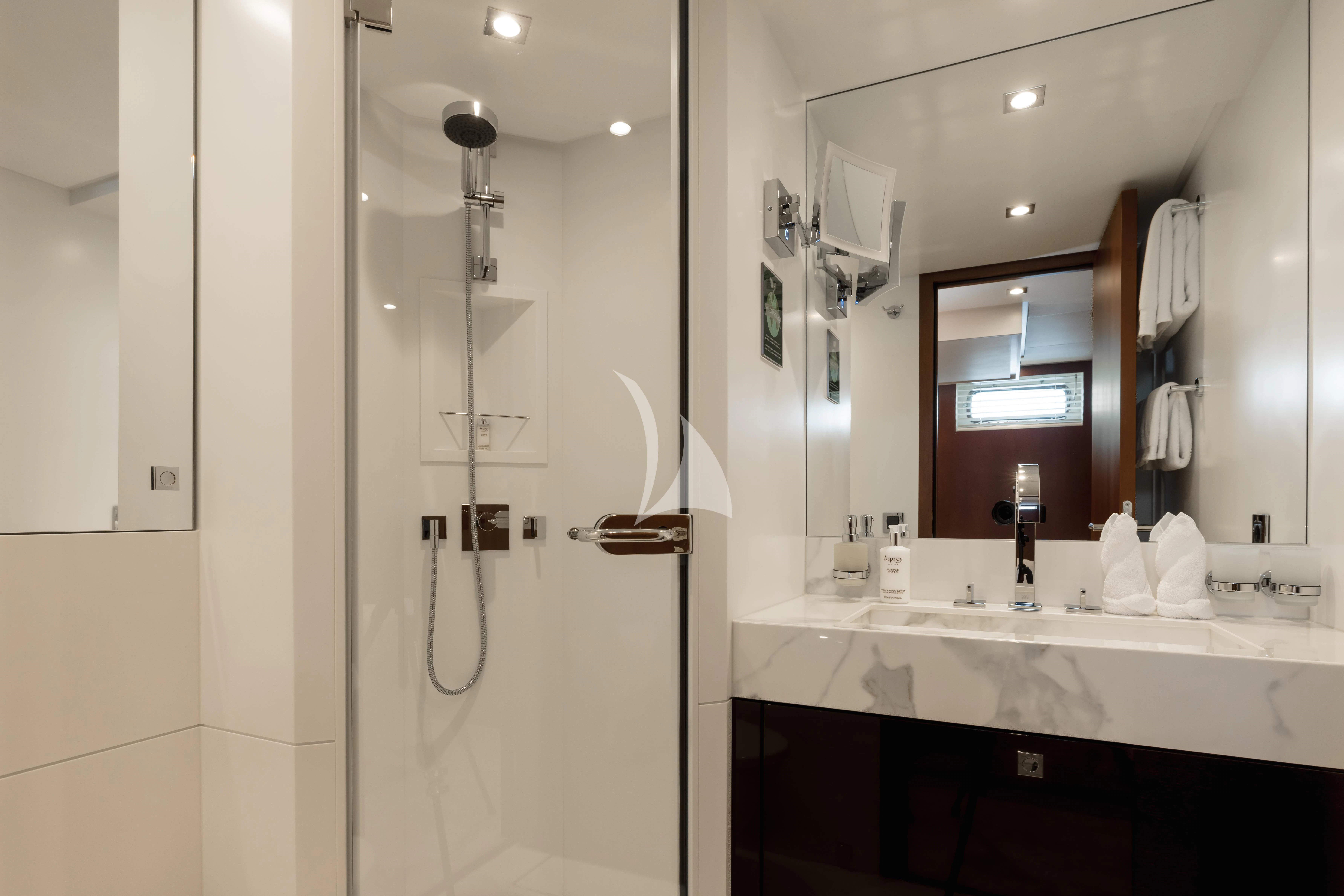 a bathroom with a shower and sink aboard ORIZZONTE Yacht for Sale