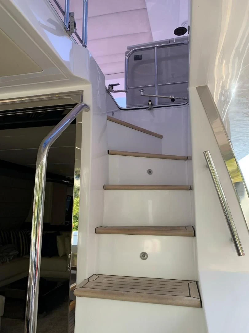 a white cabinet with drawers aboard AMALFI Yacht for Sale