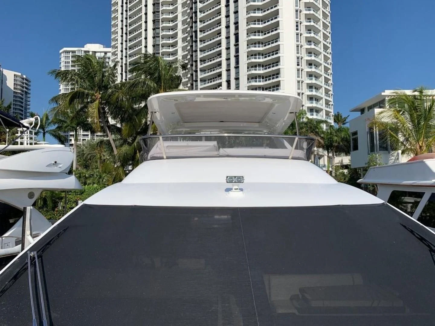 a white boat in a harbor aboard AMALFI Yacht for Sale