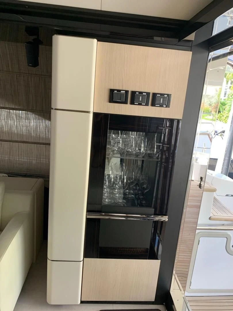 a glass display case in a room aboard AMALFI Yacht for Sale