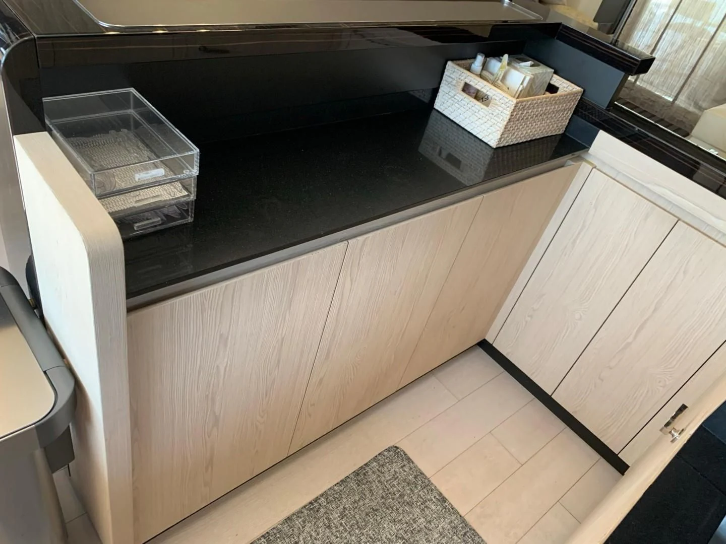 a kitchen counter with a shelf aboard AMALFI Yacht for Sale