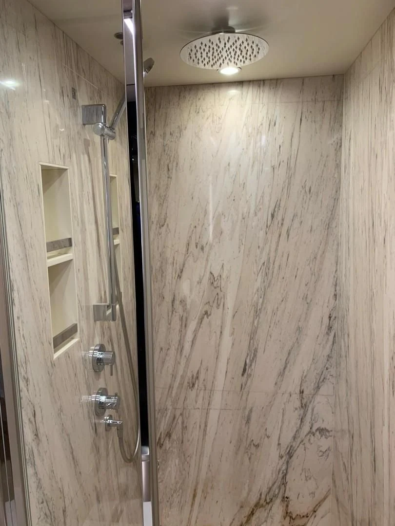 a shower with a mirror aboard AMALFI Yacht for Sale