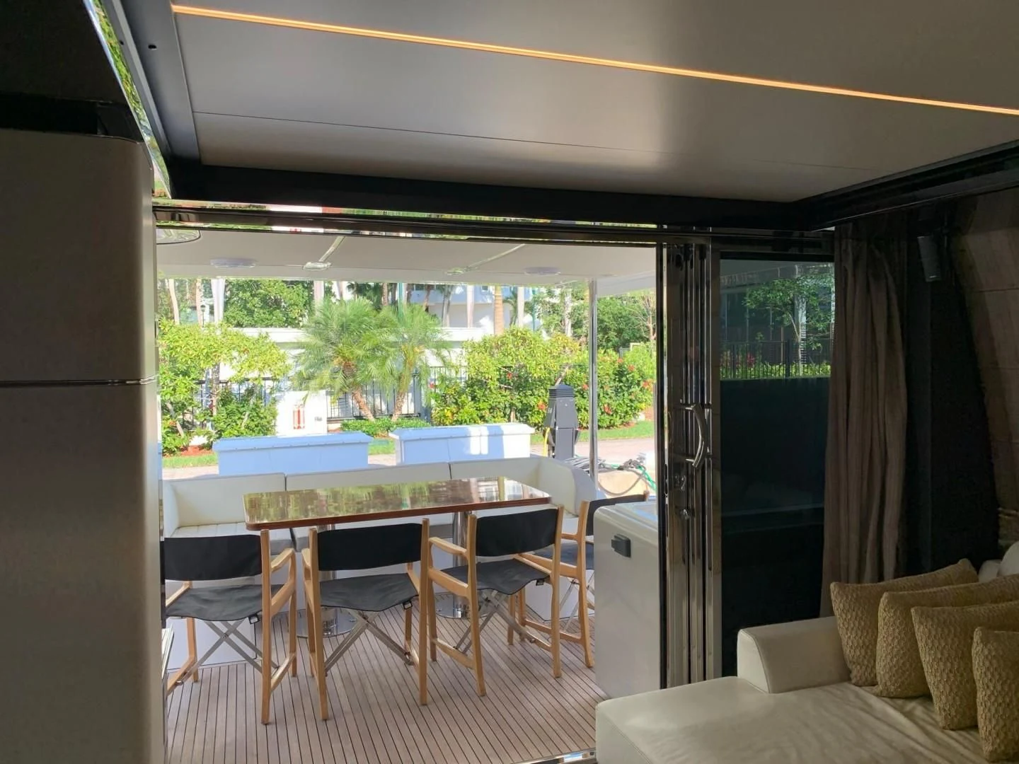 a room with a table and chairs aboard AMALFI Yacht for Sale