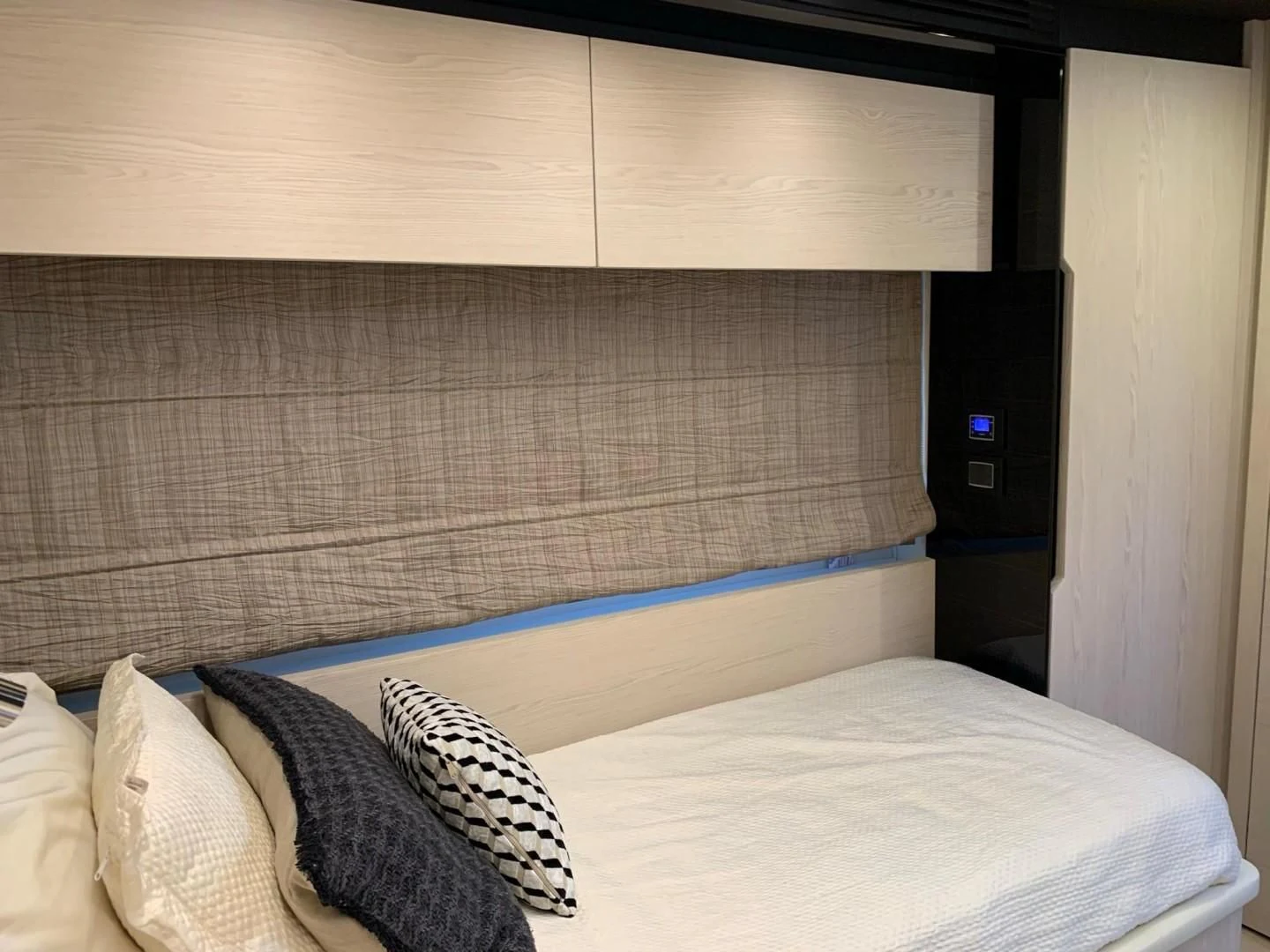 a bed with pillows aboard AMALFI Yacht for Sale