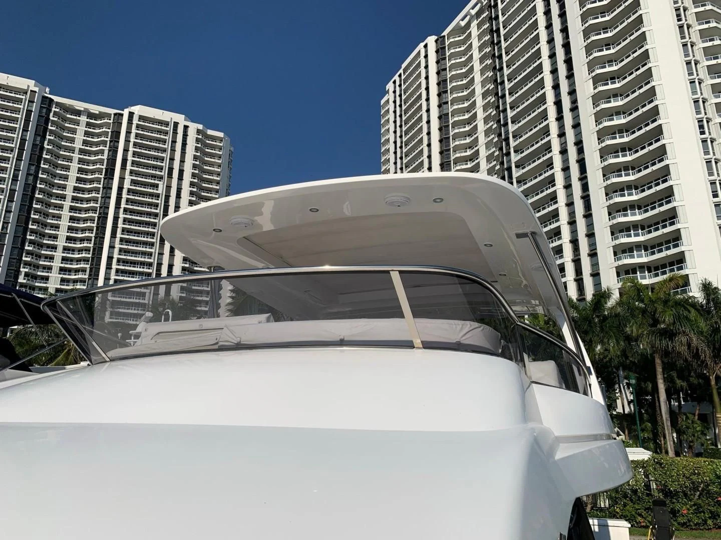 a white car in a city aboard AMALFI Yacht for Sale