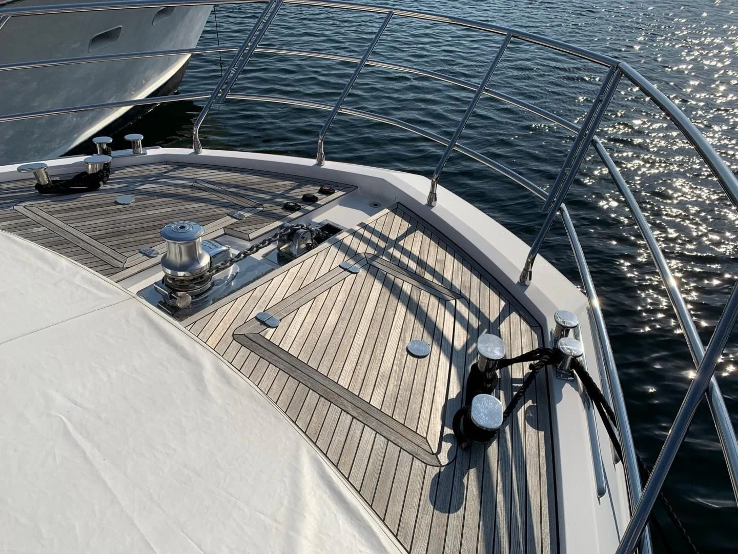 a large ship with a large ship in the water aboard AMALFI Yacht for Sale