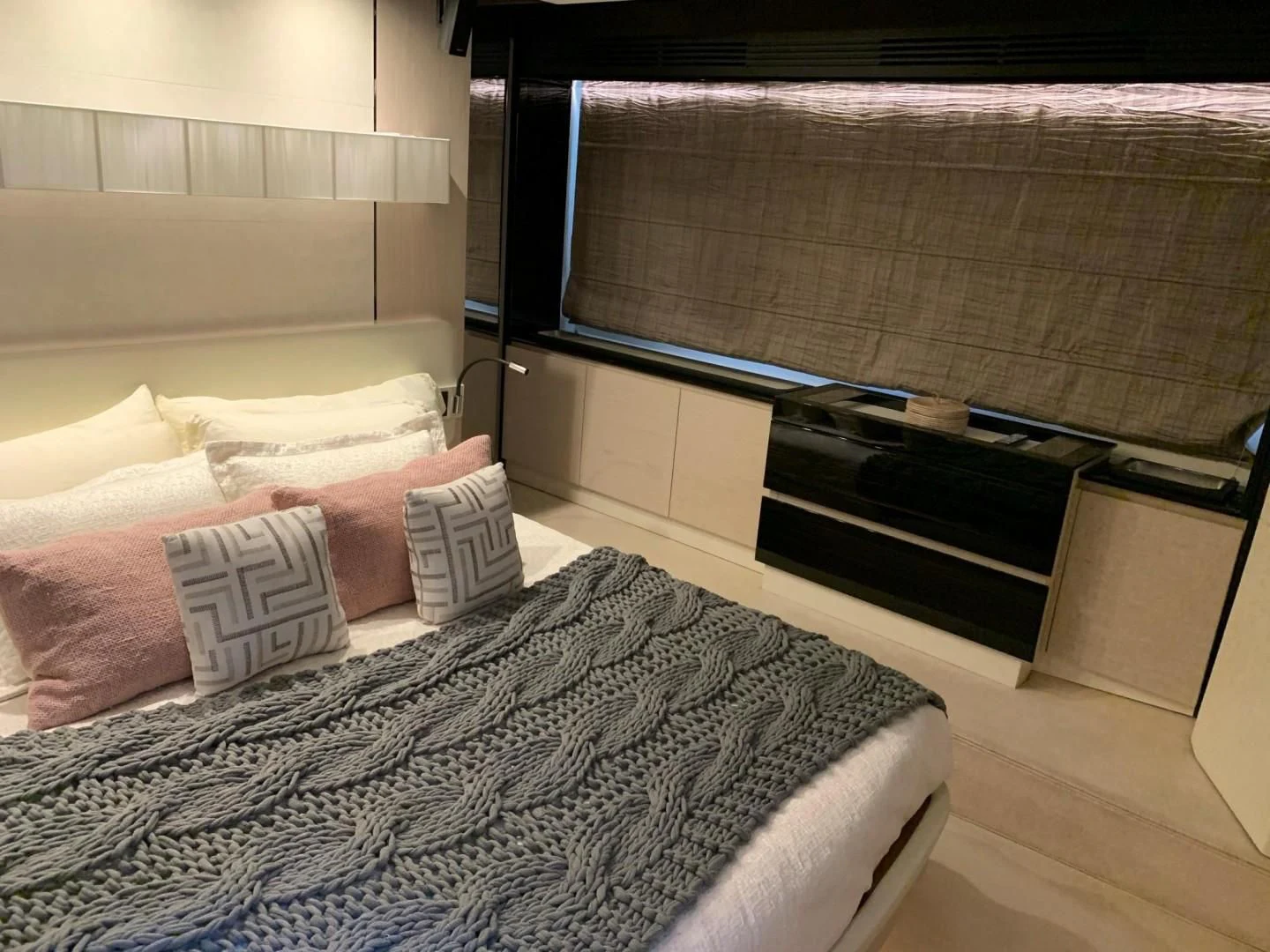 a bed with pillows and a bed aboard AMALFI Yacht for Sale
