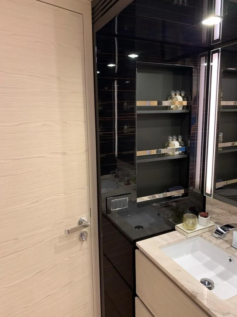 a bathroom with a glass door aboard AMALFI Yacht for Sale