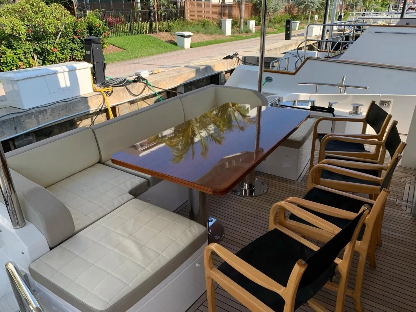 a small pool with a table and chairs aboard AMALFI Yacht for Sale