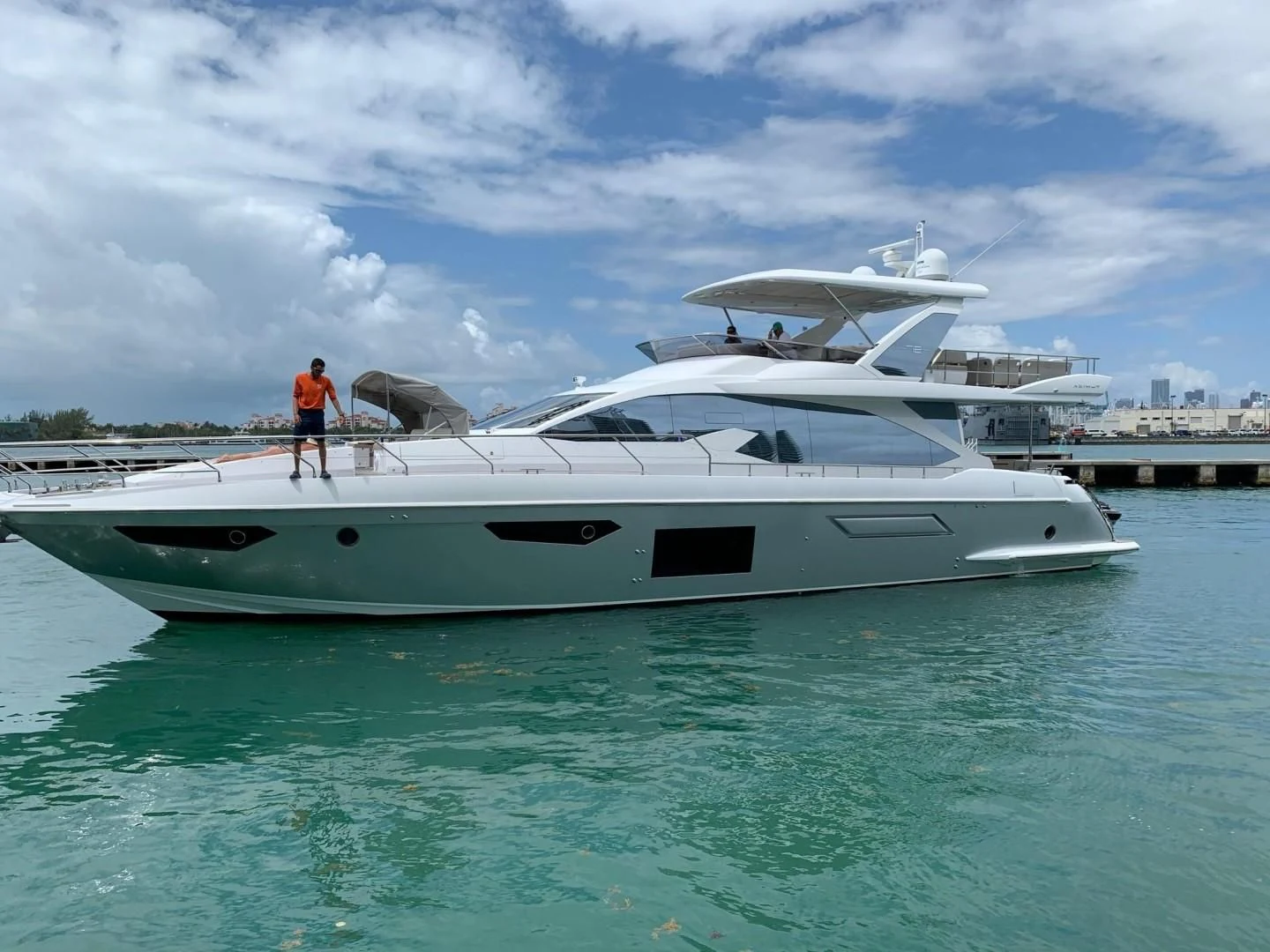 a person standing on a boat aboard AMALFI Yacht for Sale