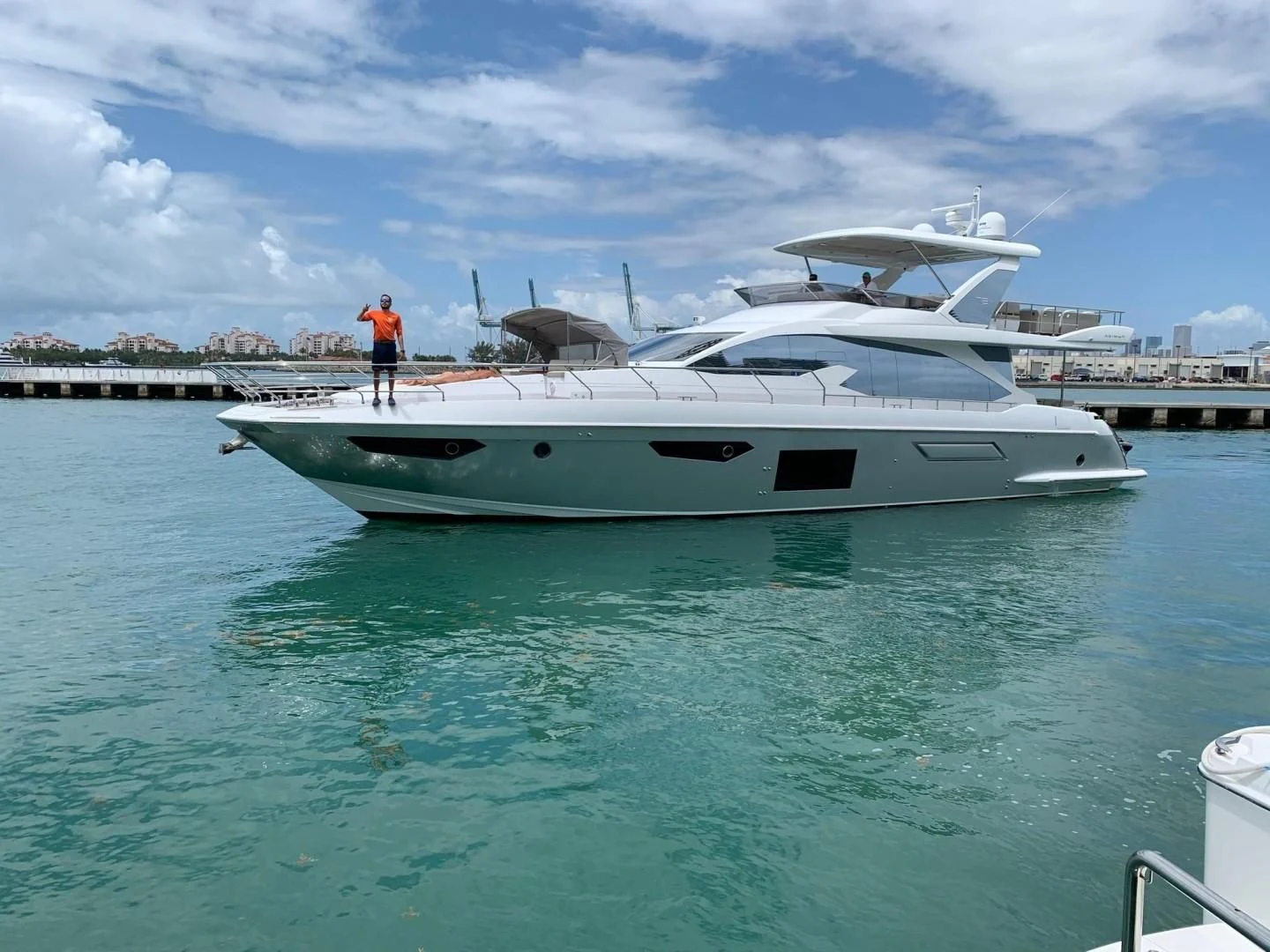 a person standing on a boat aboard AMALFI Yacht for Sale