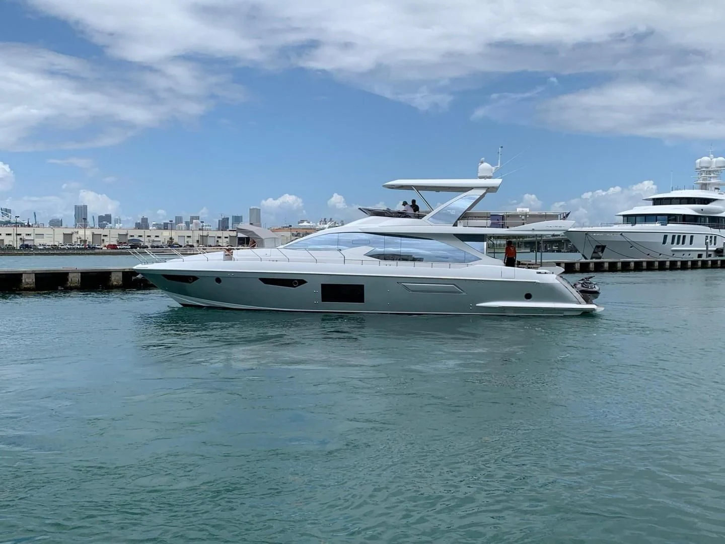 a white yacht in the water aboard AMALFI Yacht for Sale