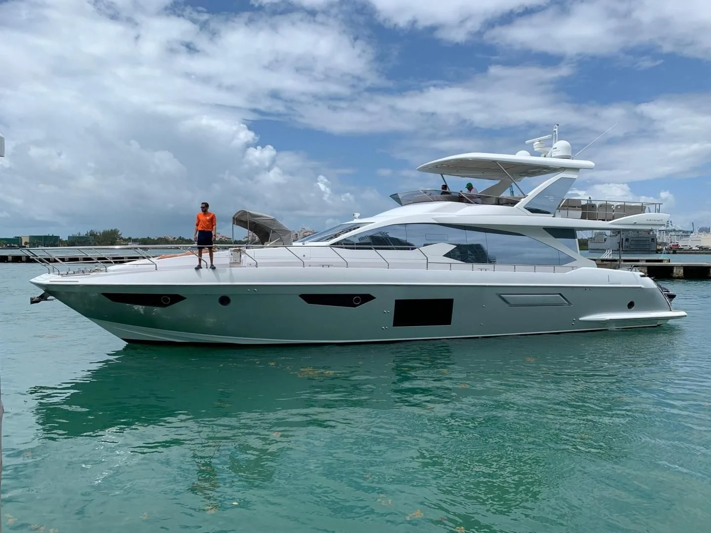a person standing on a boat aboard AMALFI Yacht for Sale
