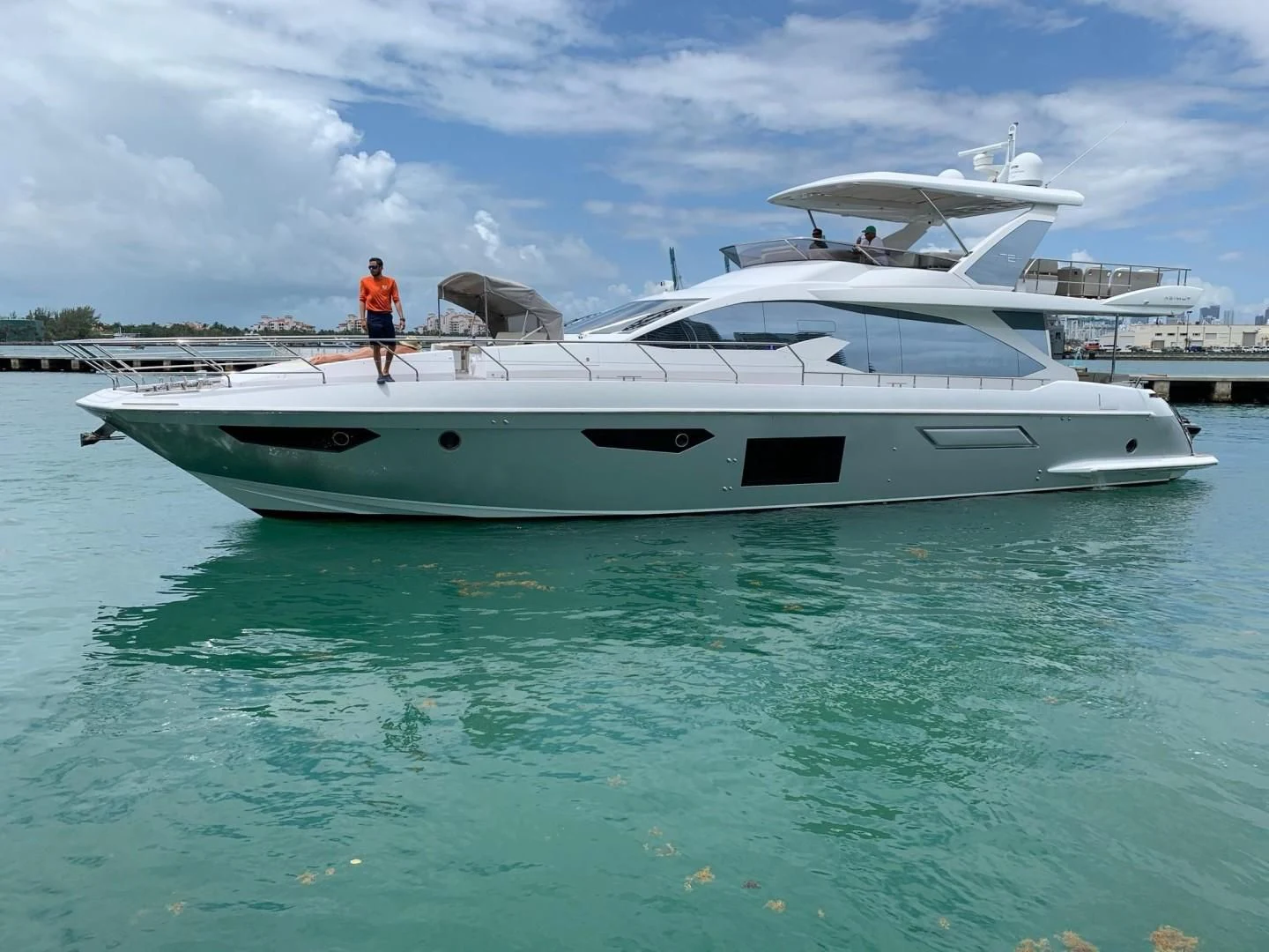 a person standing on a boat aboard AMALFI Yacht for Sale