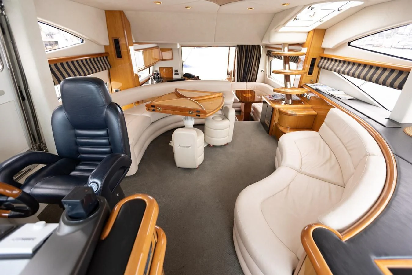 a room with a bed and desk aboard BIG DREAM Yacht for Sale