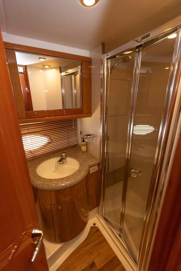 a bathroom with a sink and a shower aboard BIG DREAM Yacht for Sale