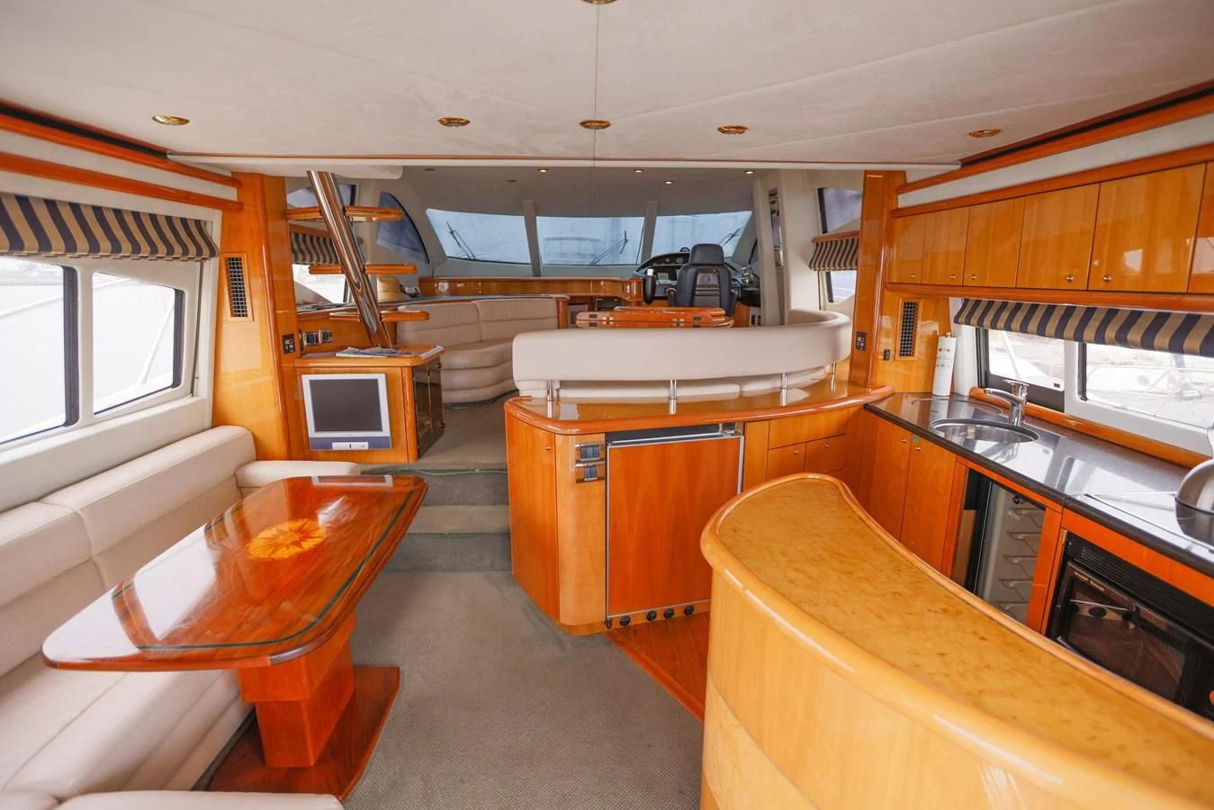 a kitchen with a large window aboard BIG DREAM Yacht for Sale