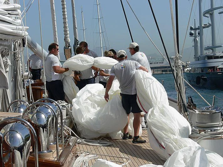 a group of people on a boat aboard METEOR Yacht for Sale