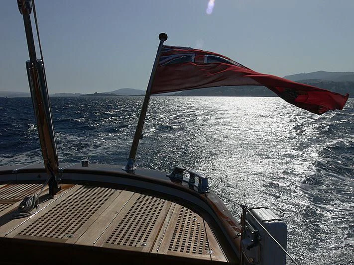 a flag on a boat aboard METEOR Yacht for Sale
