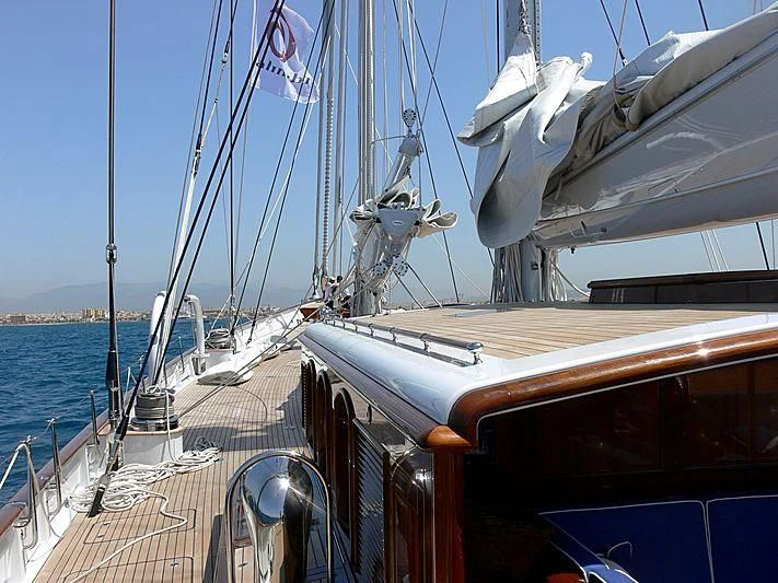 a boat with a sail aboard METEOR Yacht for Sale