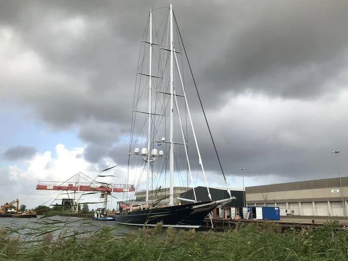 a boat docked at a pier aboard METEOR Yacht for Sale