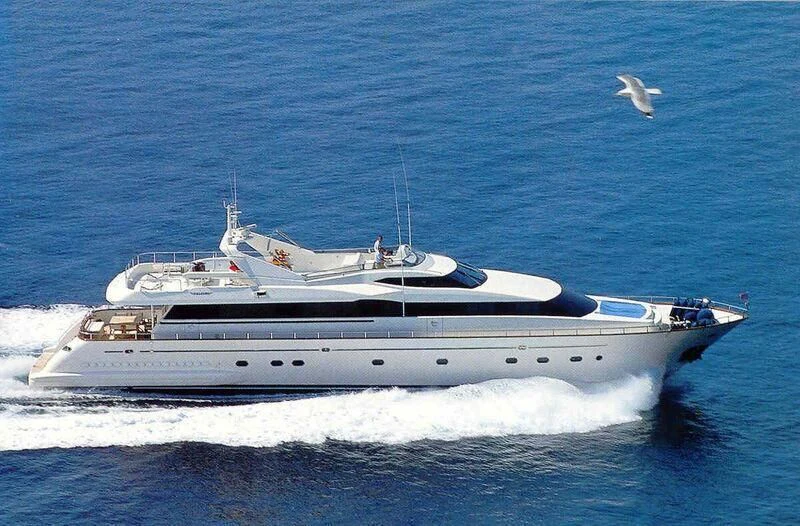 a white yacht in the water aboard ELMAR Yacht for Sale