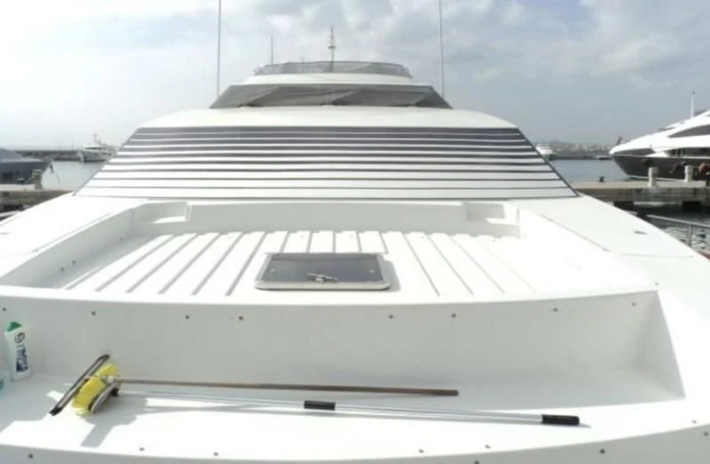 a white building with a black roof aboard ELMAR Yacht for Sale