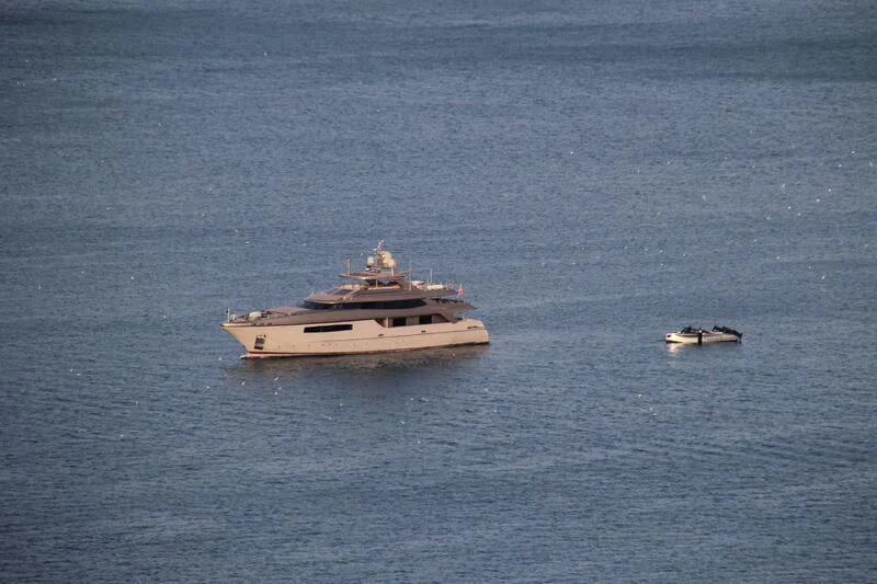 a boat in the water aboard UNPLUGGED Yacht for Sale