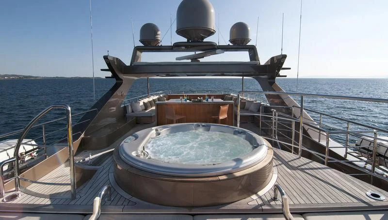 a boat on a deck aboard UNPLUGGED Yacht for Sale